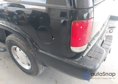 2001 GMC Jimmy Luxury из США, поврежденный, VIN 1GKCS63W812105518